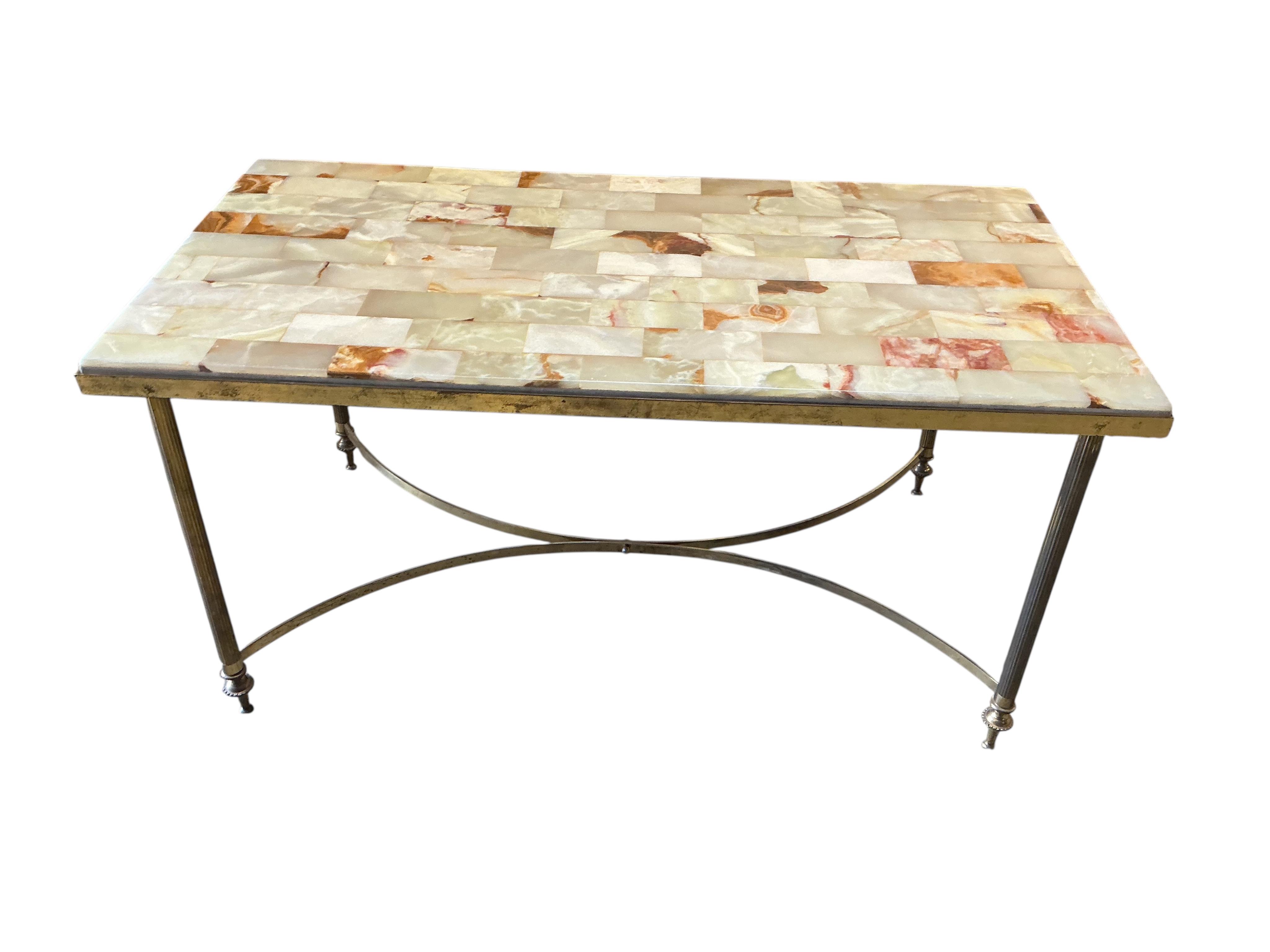 A rectangular brass and onyx coffee table, width 87cm, depth 46cm, height 42cm